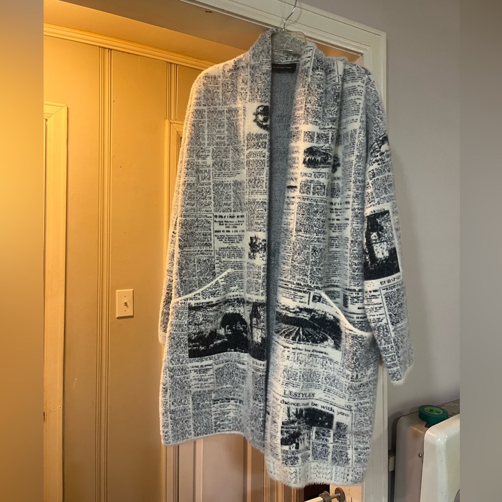Love at First Find Newspaper Sweater